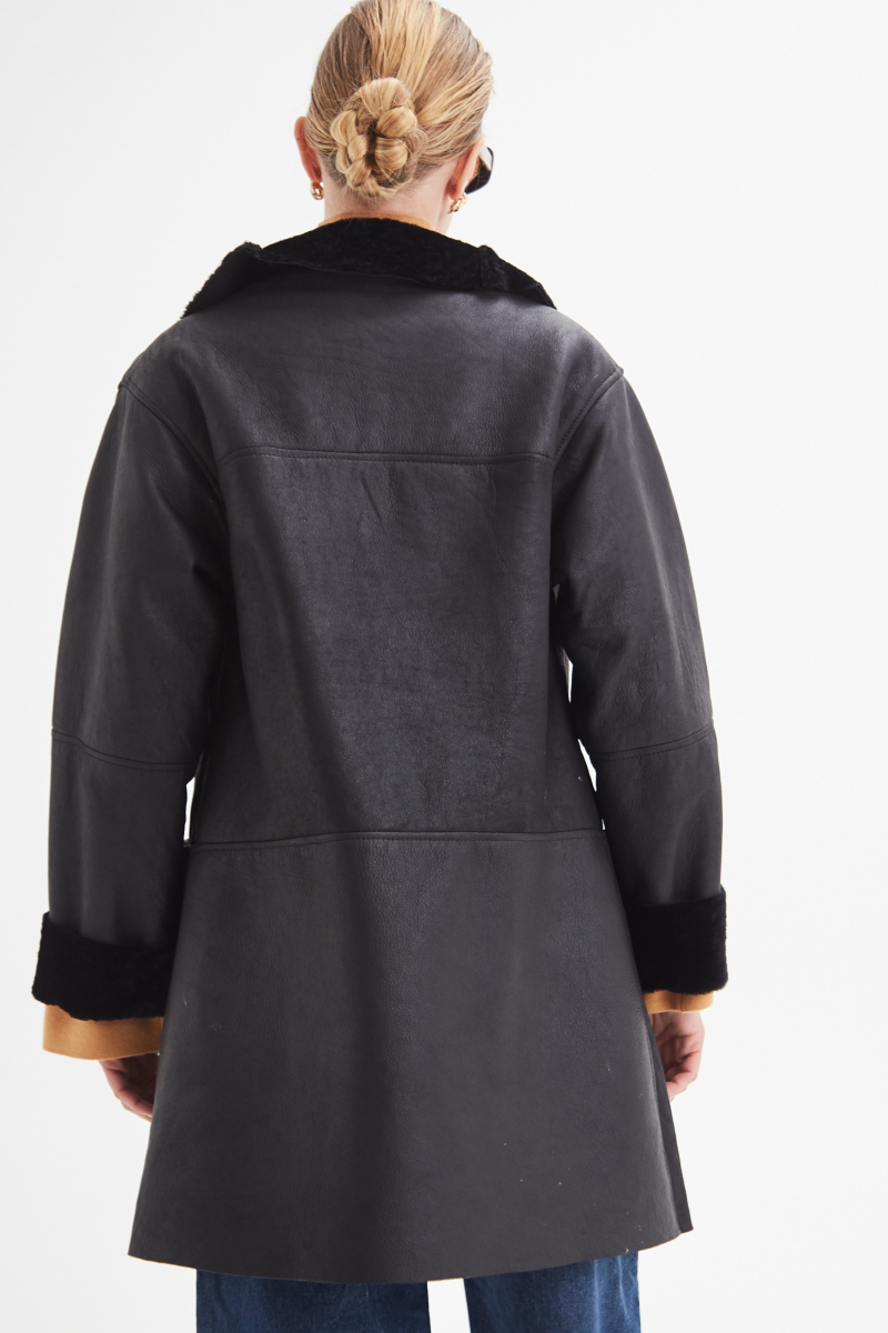 TAPADO REVERSIBLE DE CUERO NAPALAN RICCI 